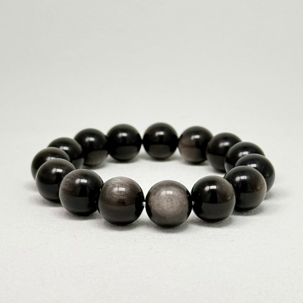 Natural Silver Sheen Obsidian Bracelet with black polished beads and silver sheen for Gentle Protection & Inner Harmony.