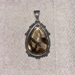 Rutilated Quartz Pendant — The Echoes of the Earth Veins